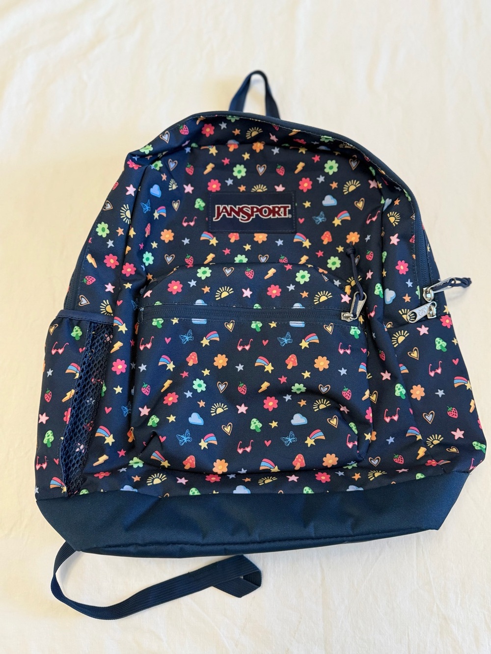 Jansport Girls Navy Backpack with Multicolor Floral & Rainbow Icons